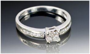 9ct White Gold Diamond Ring, Set With Four Princess Cut Diamonds, Channel Set Round Cut Diamond