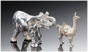 Two Silver Model Animals, 1. A Realistic Depiction Of A Llama, probably Peruvian, marked 925. 1``