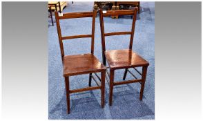 Pair Of Mahogany Bedroom Chairs with cross banding to back. Originally caned.