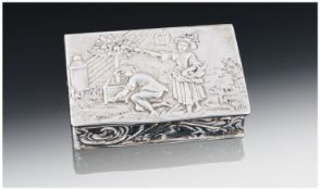 A Dutch Silver Snuff Box With Hinged Lid And Silver Gilt Interior. The top decorated in relief with