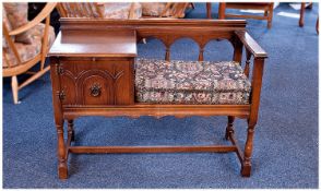 20th Century Oak Telephone Seat, with loose seat cushion, galleried back, fitted with brushing