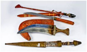 Three Display Daggers/Knives And Scabbards, Together With A Riding Crop. All Made For The Tourist