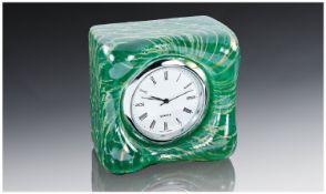 An Alum Bay (Isle-of-Wight) Glass Bedside Clock. Square shape with rounded edges. Sea green colour