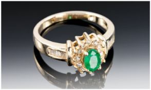 14ct Gold Emerald And Diamond Dress Ring, Set With A Central Oval Deep Green Emerald Surrounded By