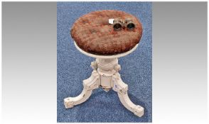 Late Victorian Revolving Piano Stool, fitted with overstuffed buttoned seat, probably original, the