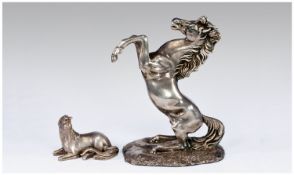 Silver Sculpture Of A Rearing Horse, Height 8¾, Marked J.925 Sterling. Together With A Silver Foal,