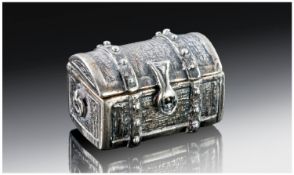 A Miniature Italian Silver Pill Box realistically designed as a treasure chest with domed hinged