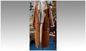 Gavin Brown Leather Ladies Full Length Coat, in tan brown, fully lined in sheep skin, medium sized.