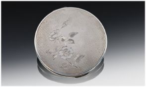 A Silver 1950`s Bright-Cut Ladies Circular Compact. Hallmark Birmingham 1958, 3`` in diameter. 103.