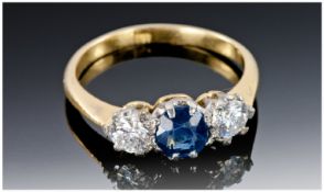 18ct Gold Diamond & Sapphire Ring,  Central Round Sapphire Set Between Two Round Brilliant Cut