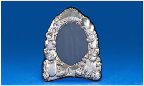 Miniature Silver Plated Frame, hallmarked for Sheffield 2002, with embossed teady bear decoration,