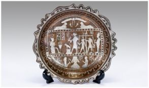 An Egyptian Copper and Silver Bowl Extensively Decorated with Hieroglyphics and Pictorial Images of