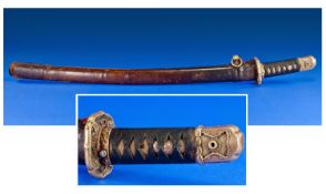 Japanese 19th Century Wakizashi Sword with leather strapped shagreen handle and bronze fittments.