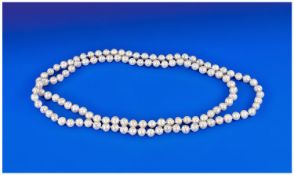 Opera Length Strand of Ivory White Cultured Freshwater Pearls, continuous strand, hand knotted