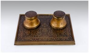Early 20th Century Brass Ink Stand, with moulded decoration to stand, complete with two ink pots.