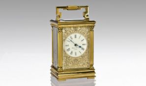 Charles Frodsham Good Quality 8 Day Brass Carriage Clock with visible escapement and ornate chased