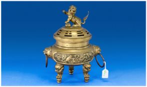 A Large Chinese Bronze Censer and Cover on Tripod Mythical Beast Legs, having lion loose ring