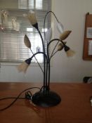 Contemporary Naturalistic Three Branch Table Lamp, each branch with flared frosted glass shades,