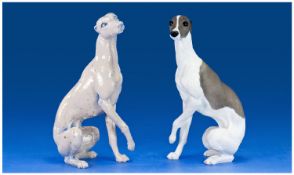 Two North Light Greyhound or Whippet Figures, the male, dark grey and white with matte finish, the