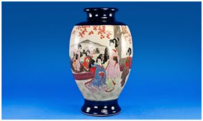 Oriental Satsuma Vase. Dark Blue ground, White oriental panels depicting oriental Scenes.