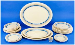 Clarice Cliff Part Dinner Service, each piece painted with bands of blue and pale brown. Marked to