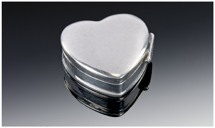 A Heart Shaped Sterling Silver Pill Box with hinged lid. Marked 925 to base.