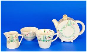 Clarice Cliff Art Deco Four Piece Bonjour Singles Tea Service. `Dryday` pattern. Circa 1930`s.