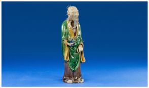 Antique Chinese Enamel On Biscuit 18th Century Figure of a holy man with a bird nestling in his hand