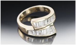 14ct Gold Diamond Ring, Set With Tapering Baguette Cut Diamonds On A Twist, Estimated Diamond Weight