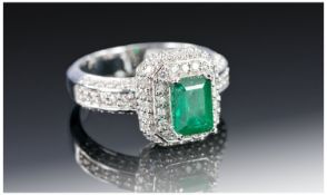 Ladies 18ct White Gold Set - Emerald and Diamond Cluster Ring. The Central Single Stone, Step Cut