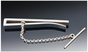 Gucci. A good quality stylish sterling silver tie-pin with safety chain. Marked 925 and ``Gucci Made