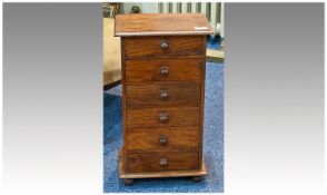 Miniature Chest of Drawers, probably of American Black Walnut, comprising six short drawers all with