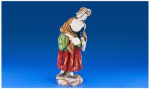 Volkstedt Late 19th Century Figure of a lady `Paper Seller`. 11.75 inches high.