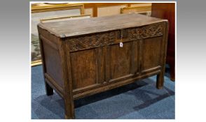 Charles II Oak Chest, inscribed and dated `A.H, 1683`, fitted with plank lid opening to reveal large