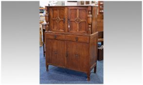 Small Oak Court Cupboard, in the Jacobean style, the upper section with Geometrically panelled doors