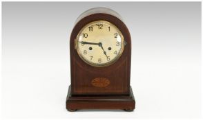 Edwardian Mahogony and Inlaid Mantel Clock, dome shaped with 8 day striking movement. Strikes on a
