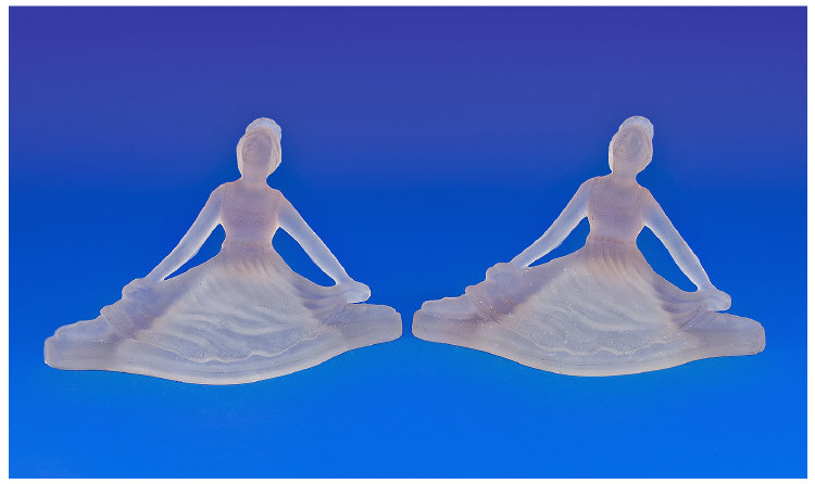 Pair of Art Deco Style Frosted Glass Figures, each of a lady performing ballet, in a salmon pink