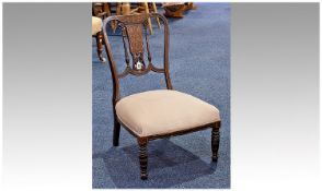 Late Victorian Walnut Nursing Chair, the back with ivory stringing, with ivory and boxwood