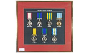 A Wall Plaque Displaying Replica Campaign Medals from 1945-1982, Well mounted in Gilt metal Frame.