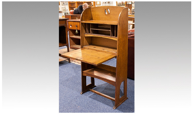 Arts and Crafts Oak Writing Desk, fall front opening to reveal multiple pigeon holes, shelf below,