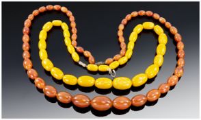 Two Amber Coloured Bead Necklaces, Both Of Graduating Form.