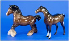 Beswick Horse Figures (2) in total. 1. `Cantering Shire`, model no 975, brown colourway, height 8.75