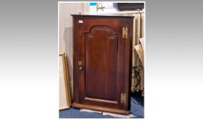 Georgian Mahogany Hanging Corner Cupboard, moulded cornice to top, the door fitted with shaped