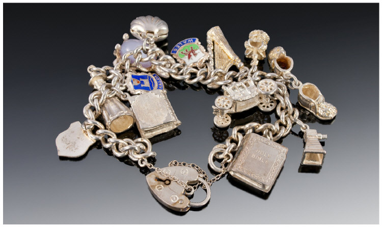 Silver Charm Bracelet, Loaded With 12 Charms, Complete With Safety Chain And Padlock.