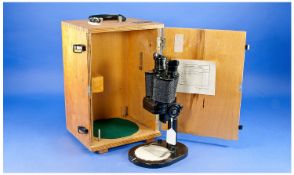 Binocular Microscope, with an adjustable stand, detachable eye pieces, stamped `?M-51-2, 8,75x,