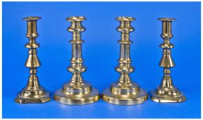Pair of Early 19th Century Brass Candlesticks, of telescopic form, retaining original pushes and