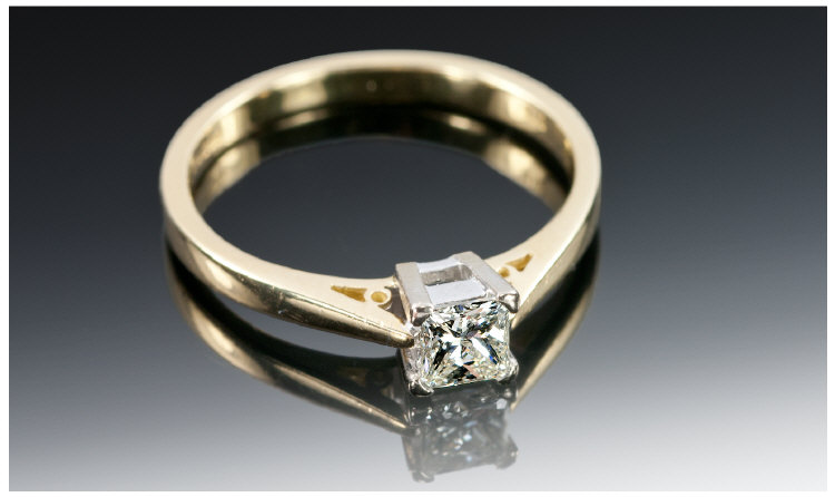 18ct Gold Diamond Solitaire Ring, Set With A Princess Cut Diamond, Estimated Diamond Weight .33ct,