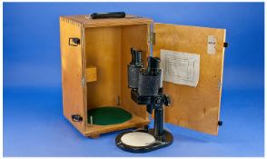 Binocular Microscope, with an adjustable stand, detachable eye pieces, stamped `?M-51-2, 8,75x,