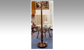 Mahogany Turned Standard Lamp, large turned column raised on a circular moulded base, no shade,