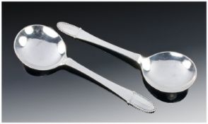 Georg Jensen. A Fine Pair Of Silver Soup Spoons In The Kugle Pattern. Each fully marked Georg Jensen